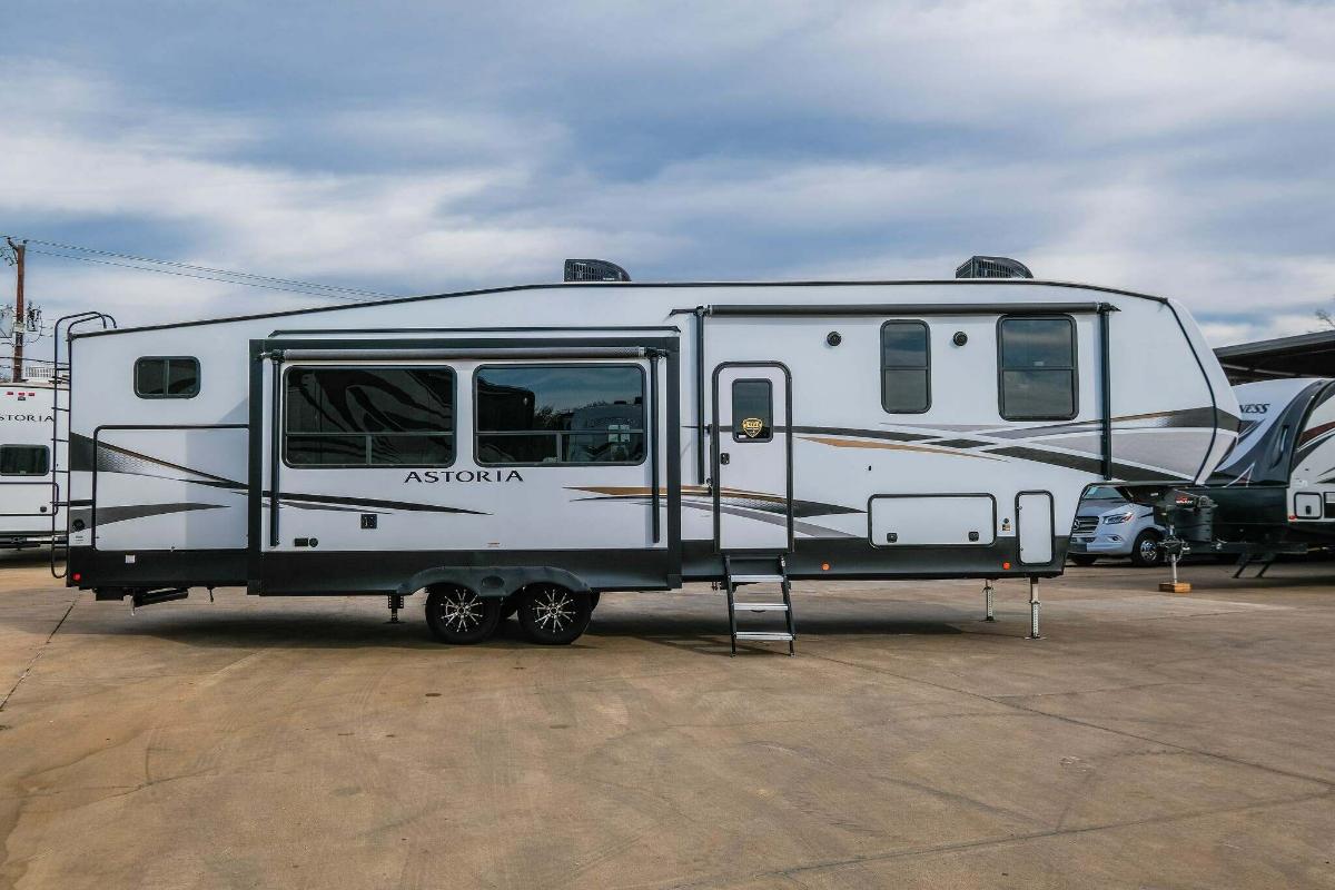 Side view of the New 2022 Dutchmen Astoria 3343BHF Fifth Wheel RV.