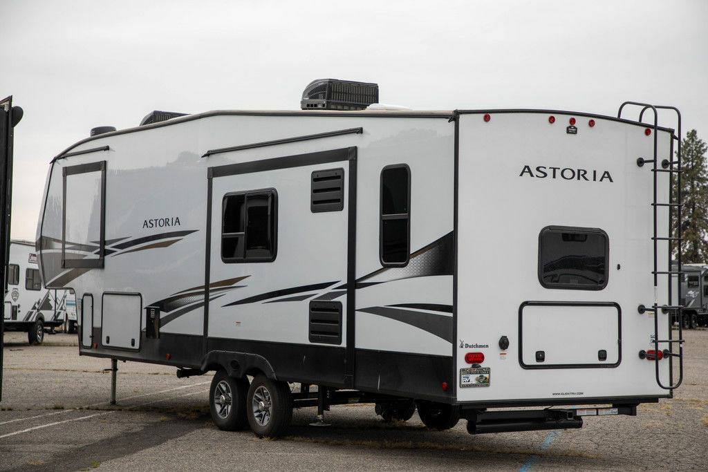 Side view of the New 2022 Dutchmen Astoria 1500 2943BHF Fifth Wheel RV.