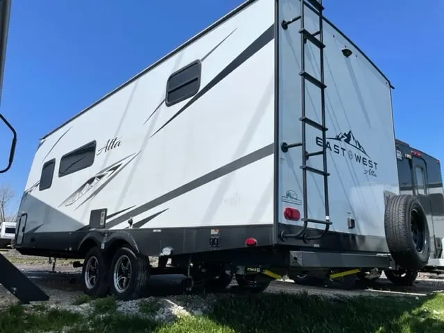 Side view of the New 2022 East To West Alta 2100 MBH Travel Trailer RV.