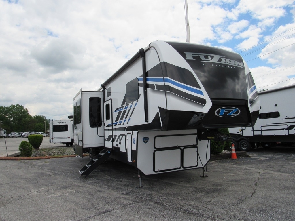 Front view of the New 2022 Keystone Fuzion 373 Fifth Wheel Toy Hauler RV.