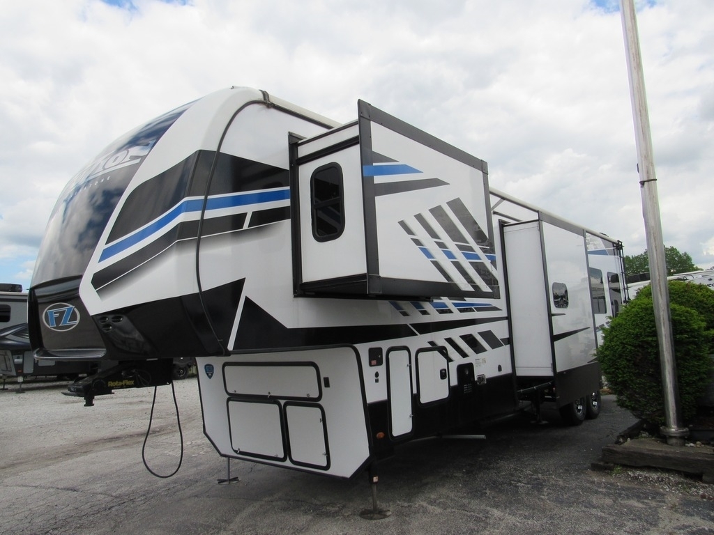 Side view of the New 2022 Keystone Fuzion 373 Fifth Wheel Toy Hauler RV.