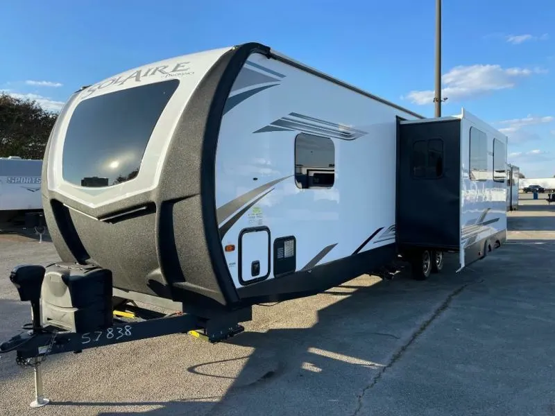 Side view of the New 2022 Palomino SolAire Ultra Lite 315DQBH Travel Trailer RV.