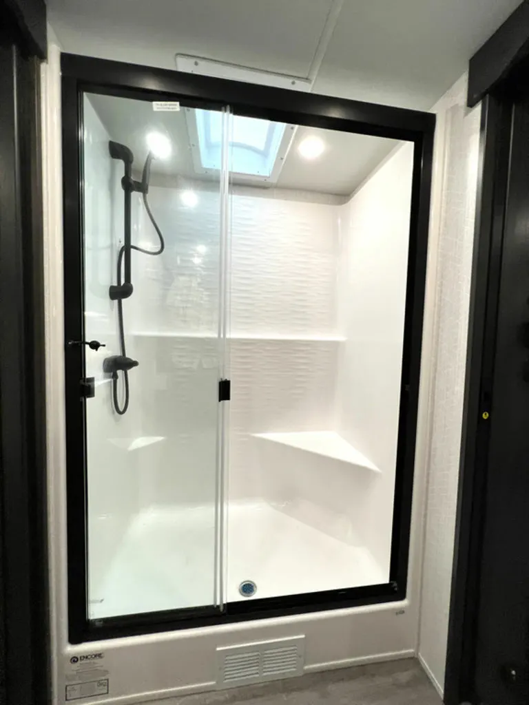 Bathroom with a walk-in shower.