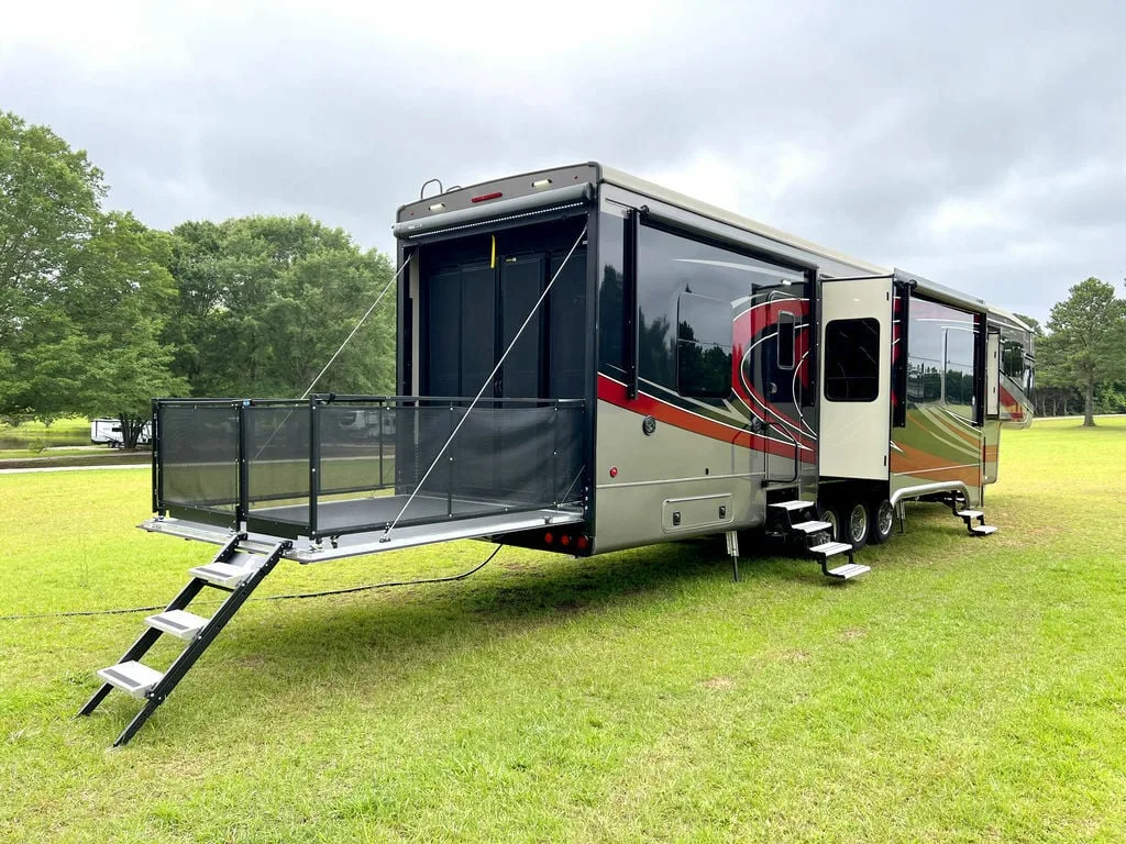 Rear view of the New 2022 DRV Fifth Wheel Fullhouse Full House Luxury LX455 Toy Hauler RV.