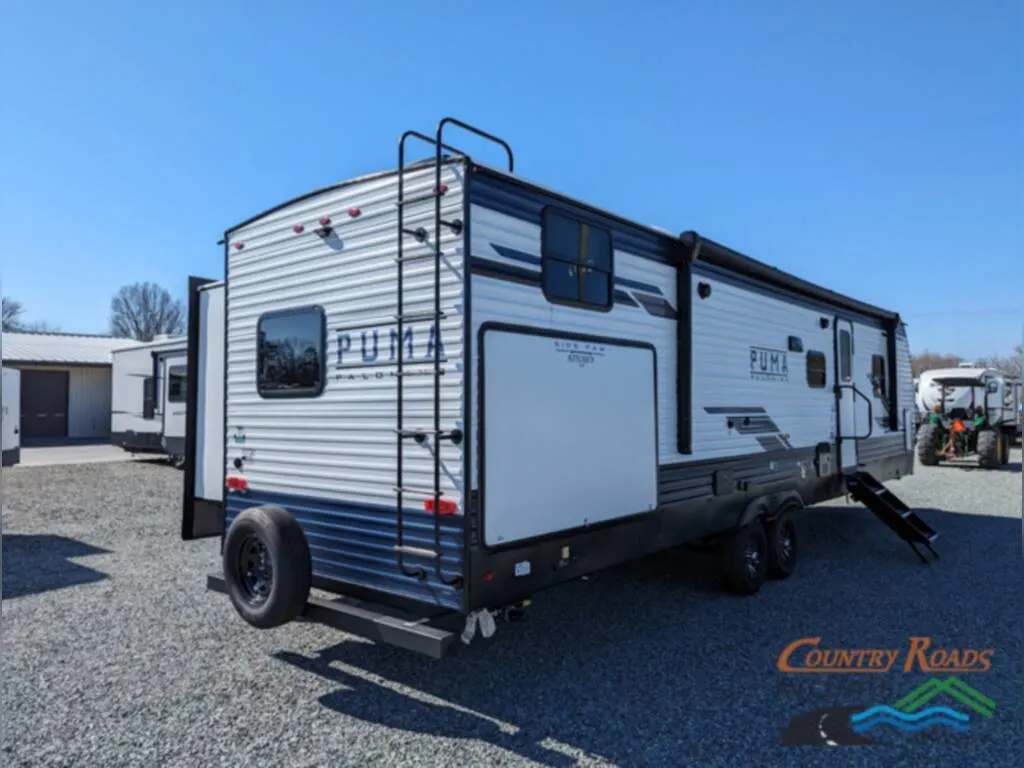 Rear view of the New 2024 Palomino Puma 32RBFQ Travel Trailer RV.