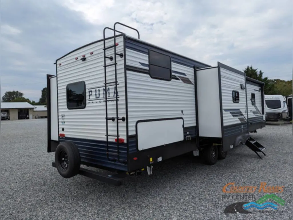 Rear view of the New 2024 Palomino PUMA 32BHFS Travel Trailer RV.