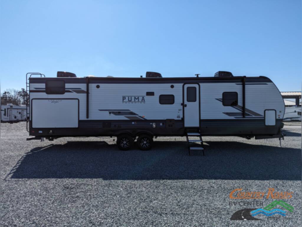 Side view of the New 2024 Palomino Puma 32RBFQ Travel Trailer RV.