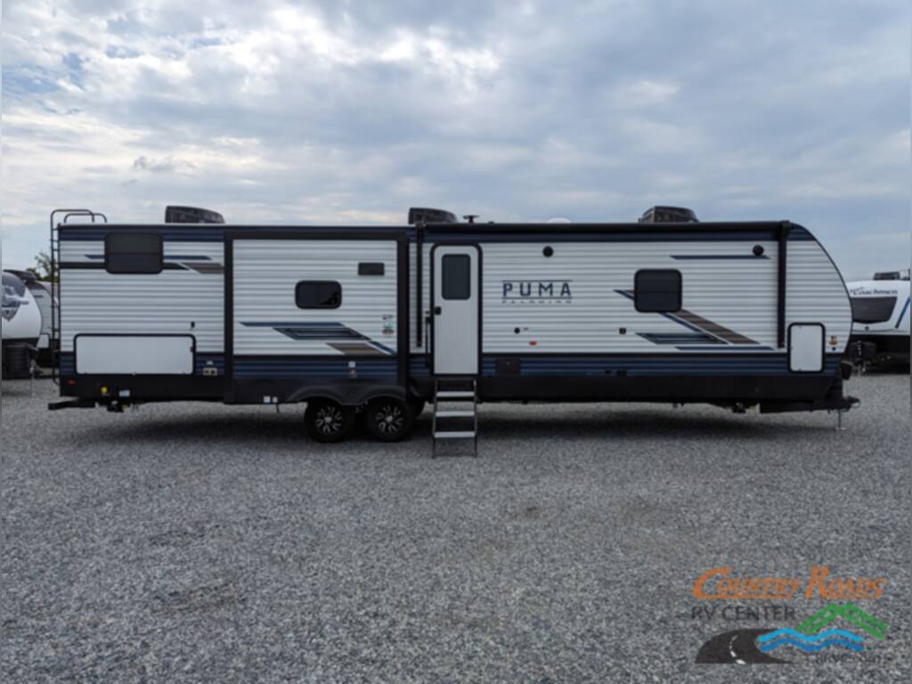 Side view of the New 2024 Palomino PUMA 32BHFS Travel Trailer RV.