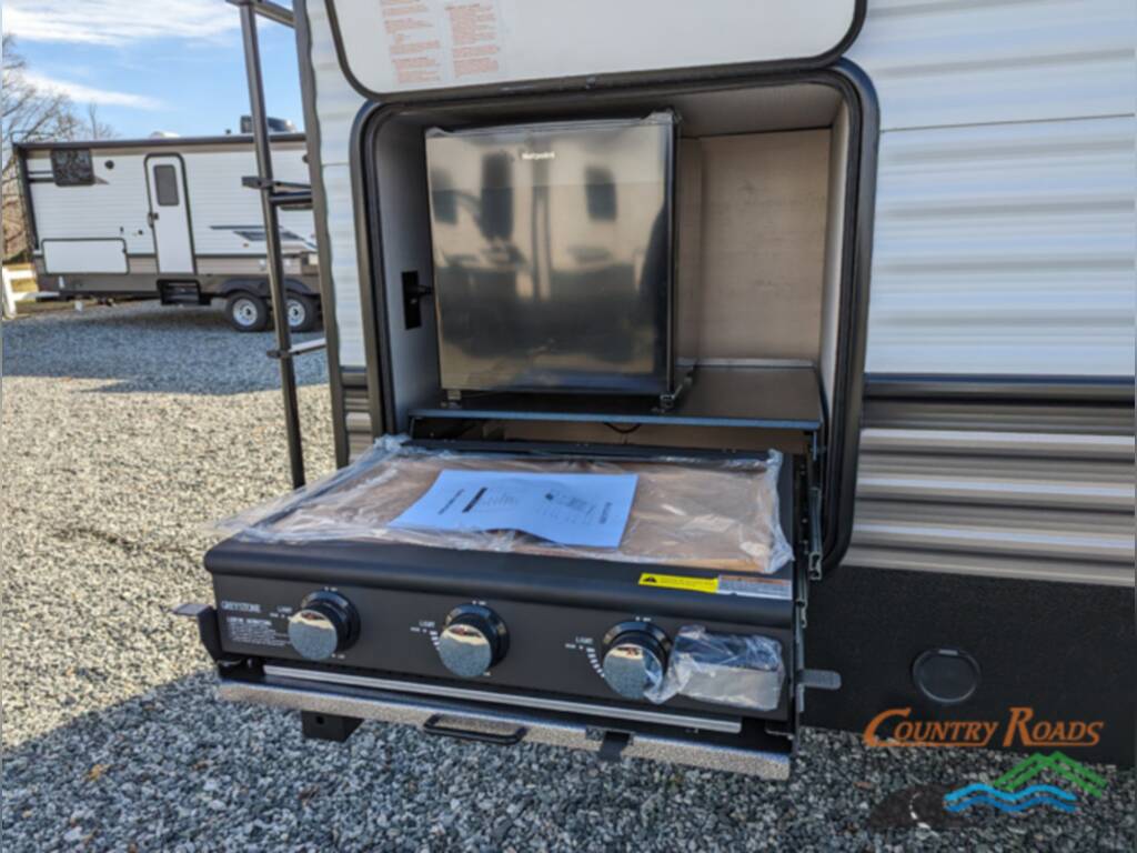 Outside kitchen with a burner.