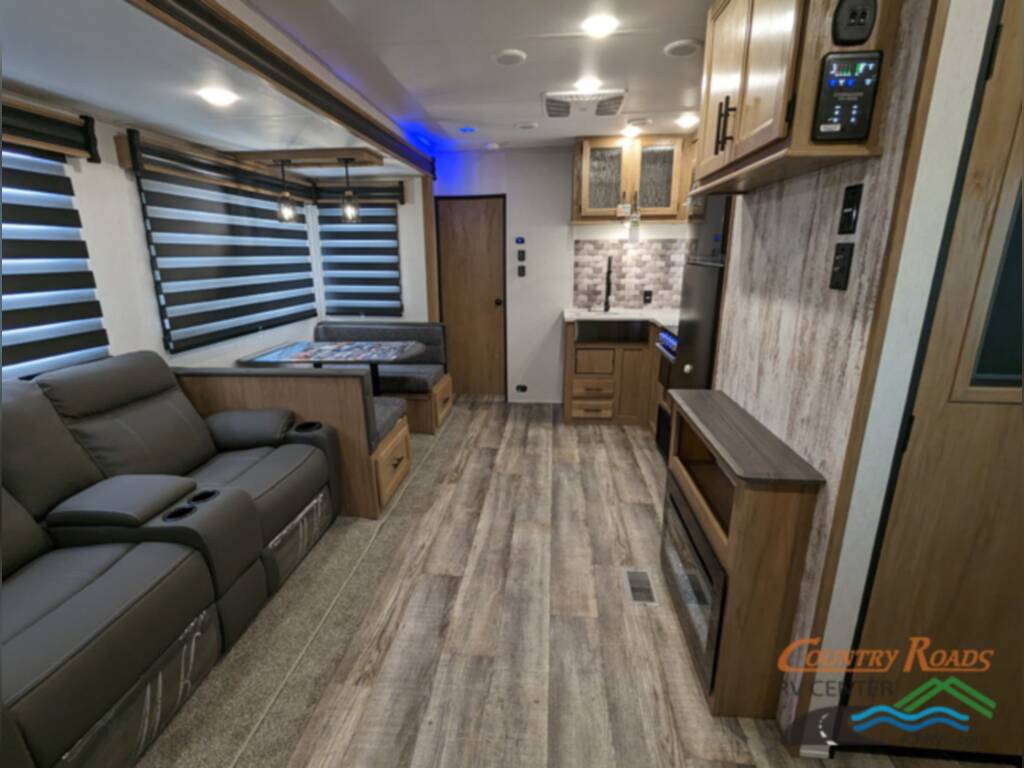 Interior of the CHEROKEE WOLF PACK 27PACK10 Travel Trailer Toy Hauler RV.