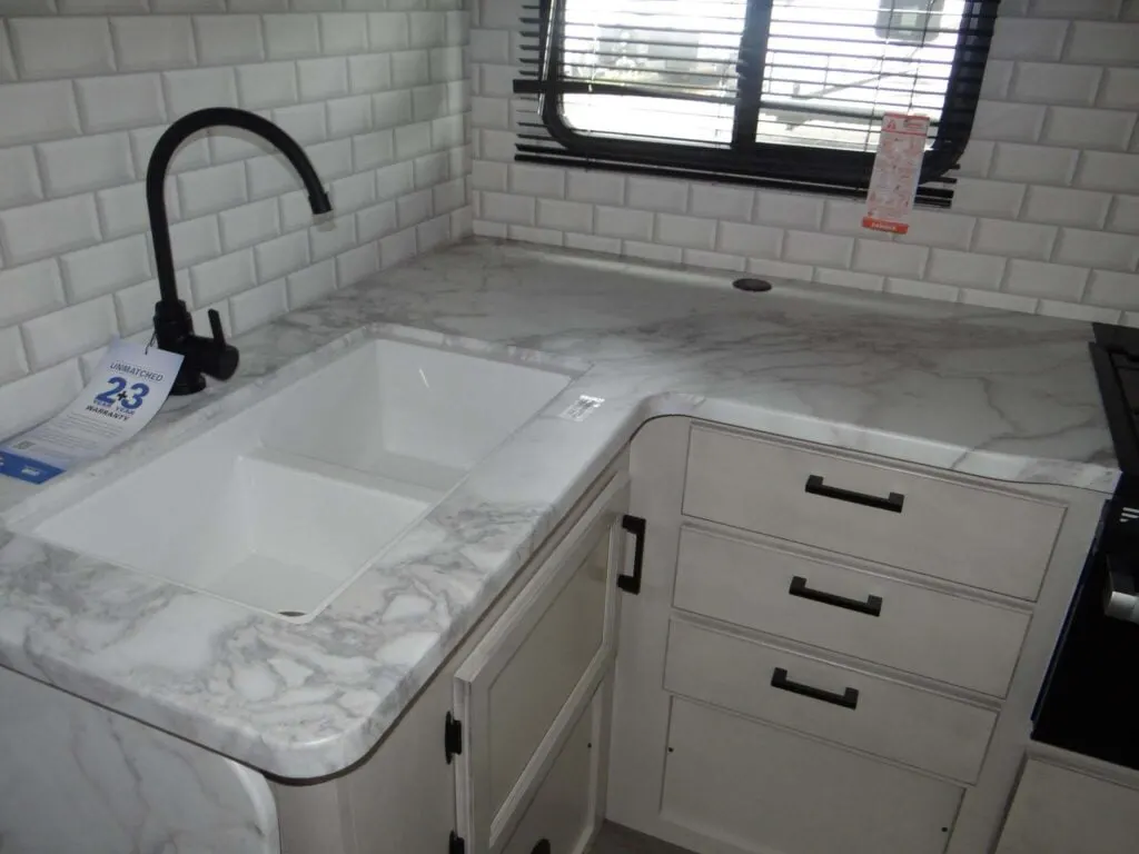 Kitchen with a sink and cabinets.