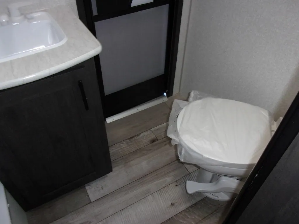 Bathroom with a sink and a toilet.