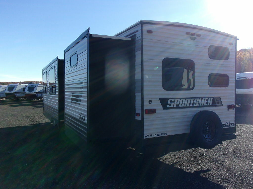 Rear view of the RV with slide outs.