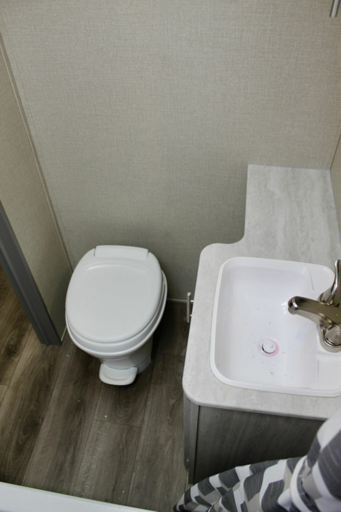 Bathroom with a sink and a toilet.