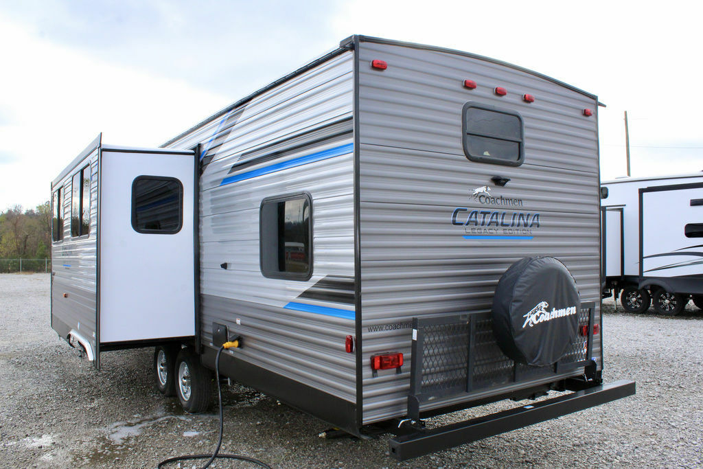 Rear view of the New 2022 Coachmen Catalina Legacy Edition 293QBCK Travel Trailer RV.