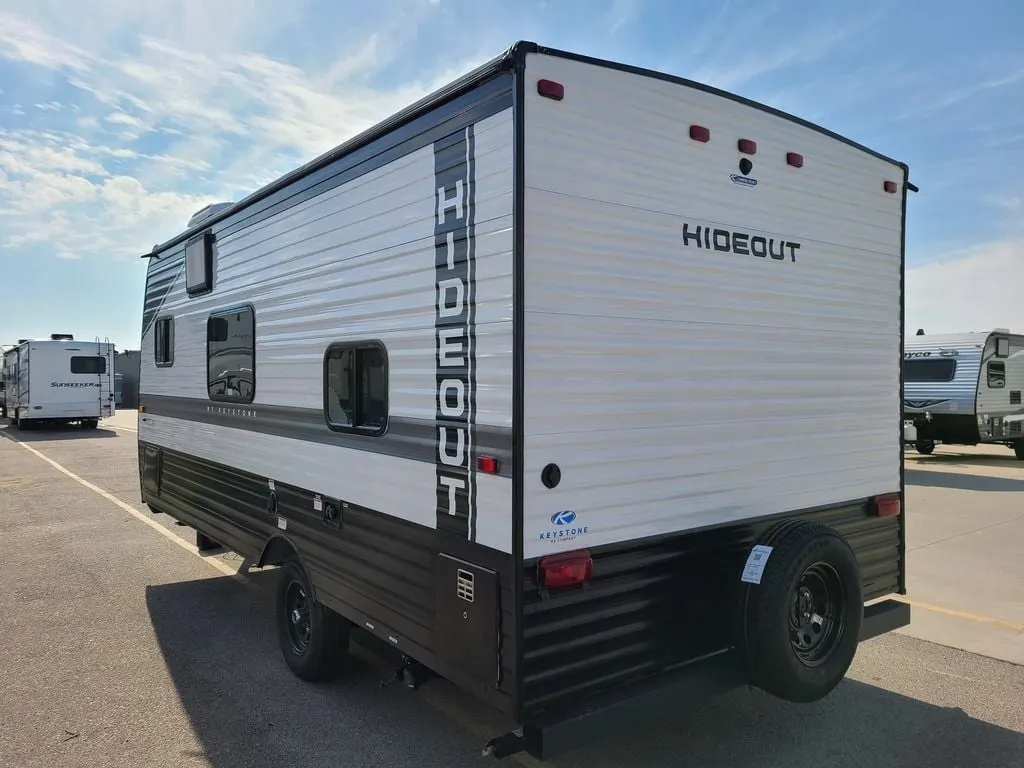 Side view of the New 2022 Keystone Rv HIDEOUT HI175BH Travel Trailer RV.