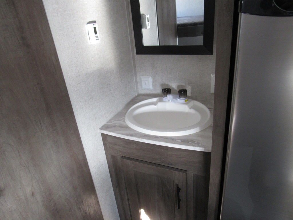 Bathroom with a sink and a medicine cabinet.