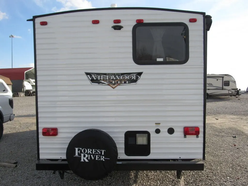 Front view of the New 2022 Forest River Wildwood X-Lite Midwest 261BHXL Travel Trailer RV.