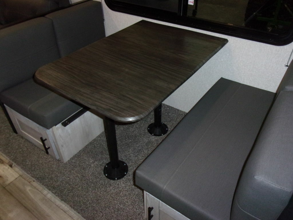 Dinette with pull-out storage drawers.