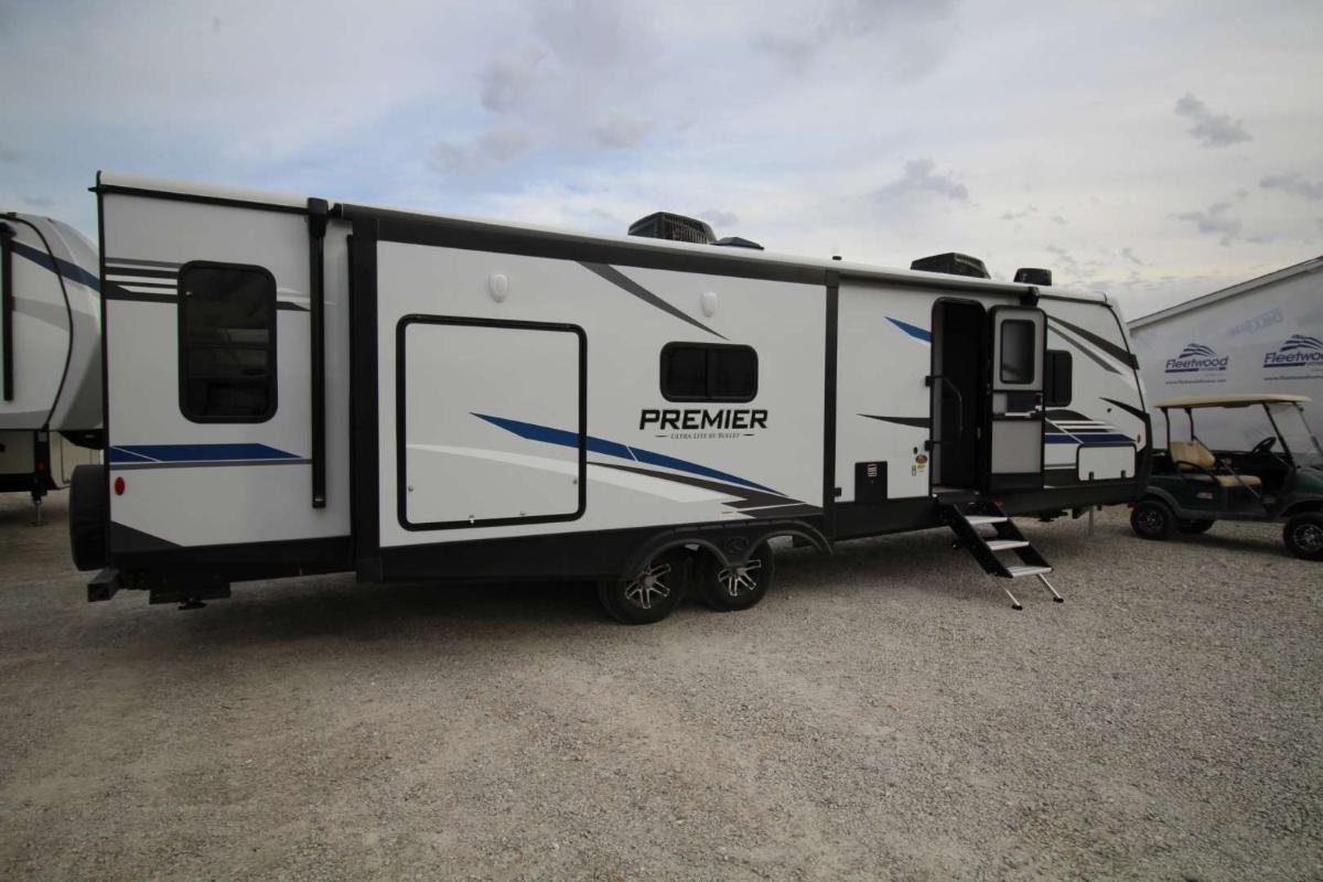 Side view of the New 2022 Keystone Bullet Premier 30RIPR Travel Trailer RV.