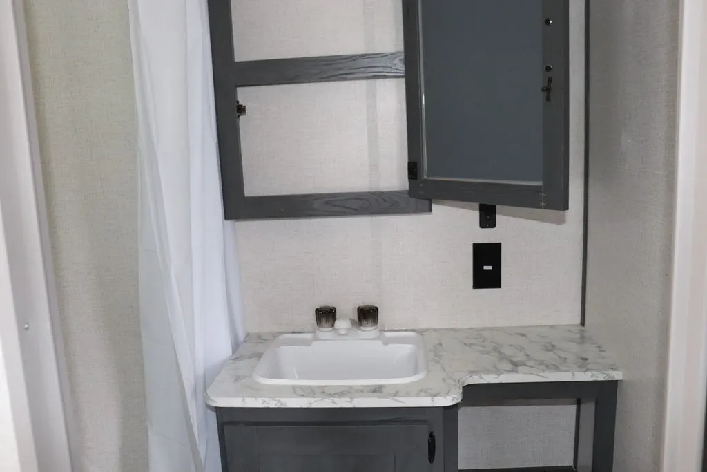 Bathroom with a sink and a medicine cabinet.