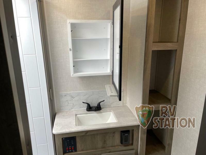 Bathroom with a sink and a medicine cabinet.