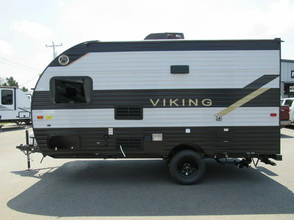 Side view of the New 2022 Coachmen Viking 16SFB Travel Trailer RV.