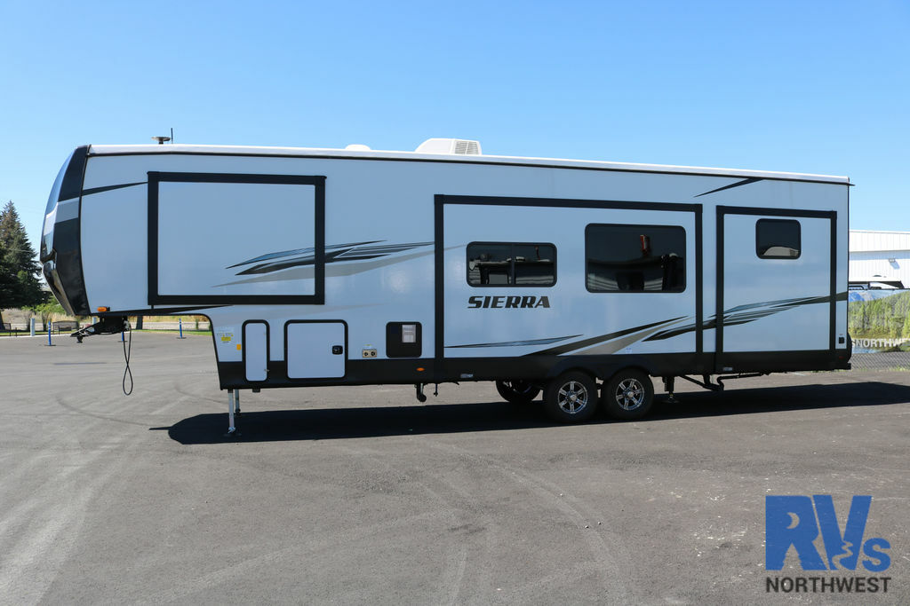 Side view of the New 2022 Forest River Sierra 3330BH Fifth Wheel RV.