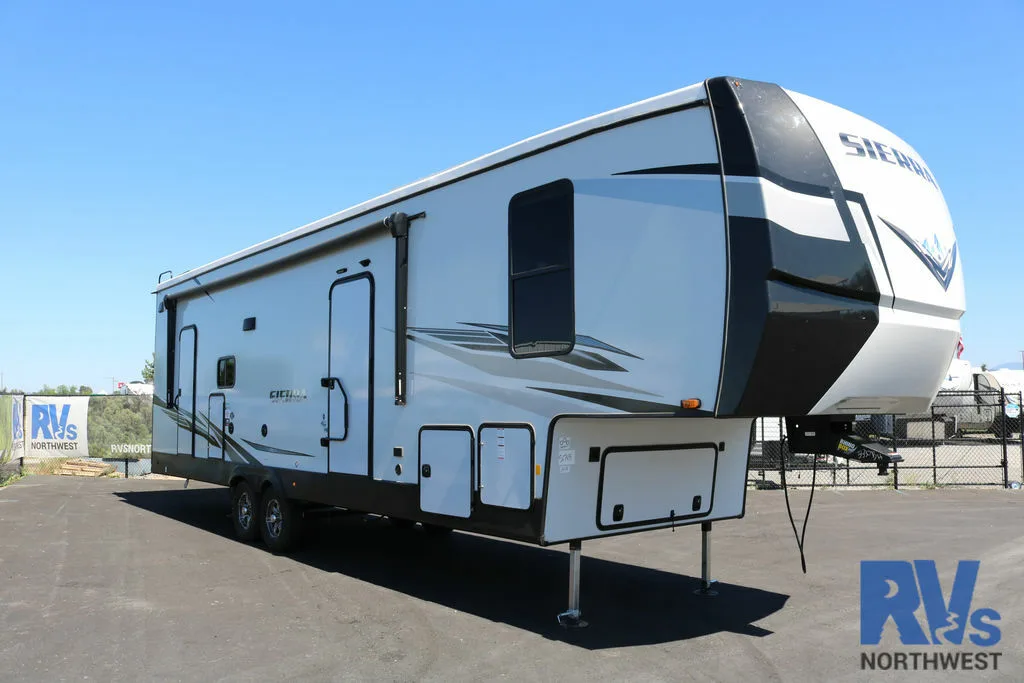 Side view of the New 2022 Forest River Sierra 3330BH Fifth Wheel RV.