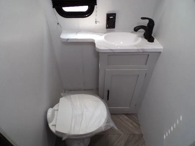 Bathroom with a sink and toilet.