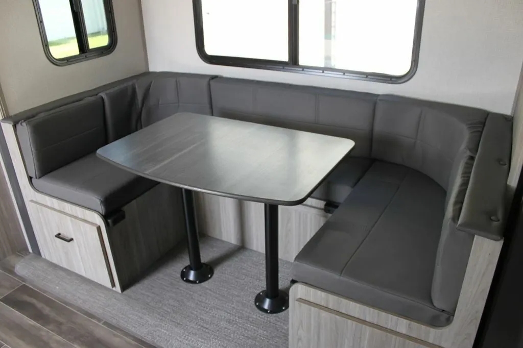 U-Dinette with pull-out storage drawers.