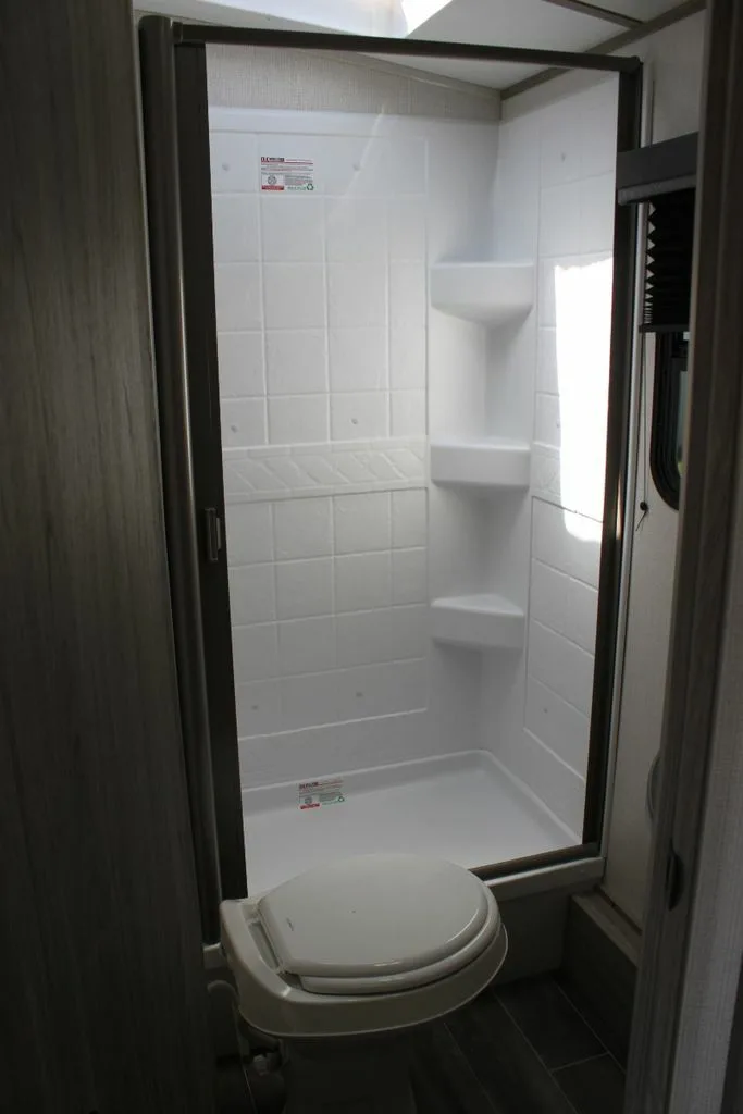 Bathroom with a toilet and a shower.