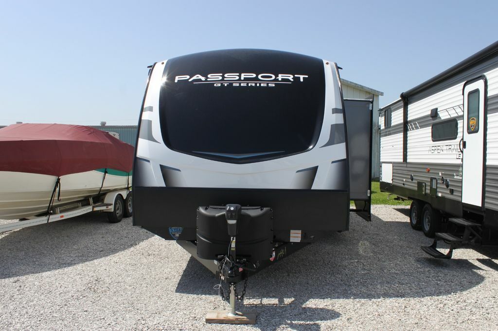 Front view of the New 2022 Keystone Passport GT 2401BH Travel Trailer RV.