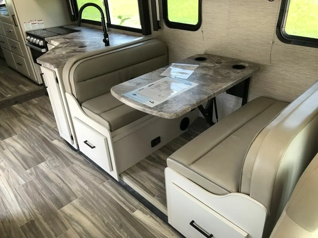 Dinette with pull-out storage drawers.