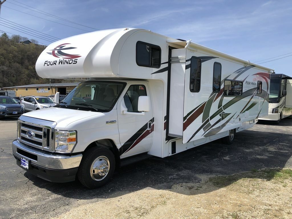 Side view of the New 2022 Thor Motor Coach Four Winds 31WV Class C RV.