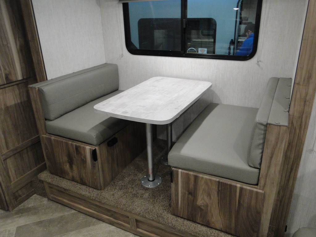 Dinette with pull-out storage drawers.