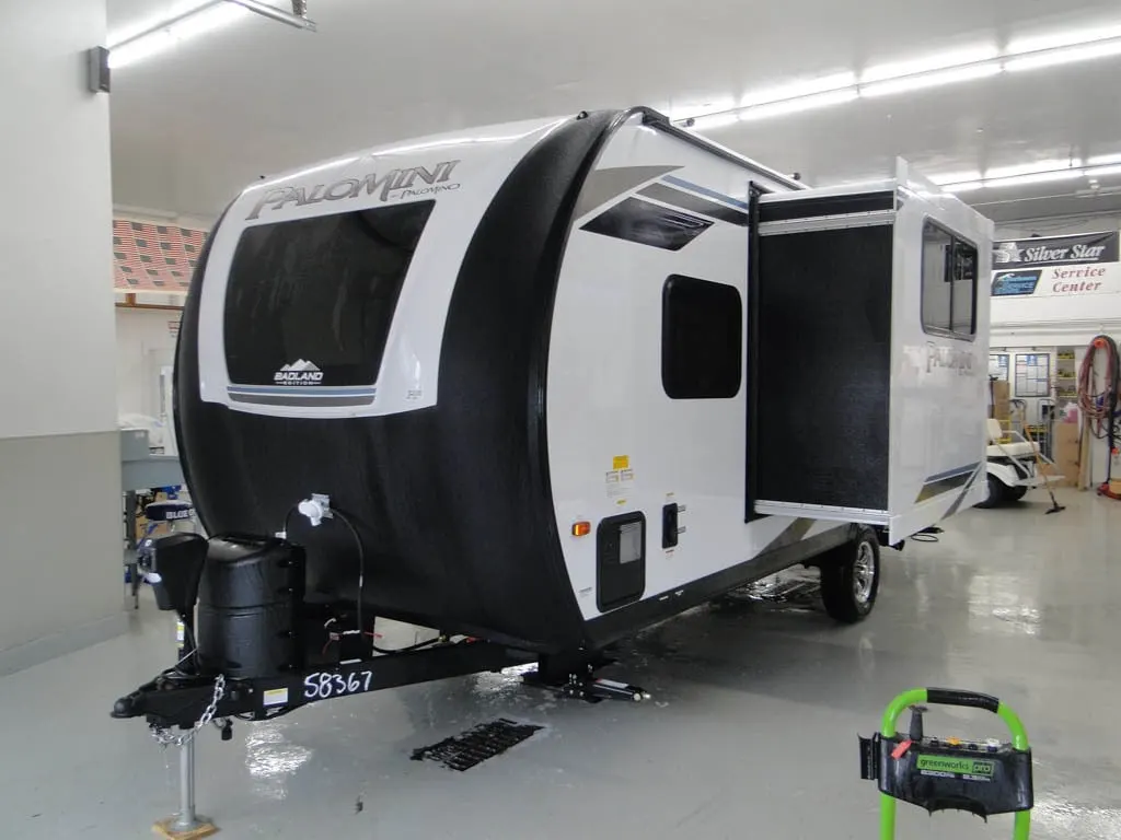 Side view of the RV with slide out.