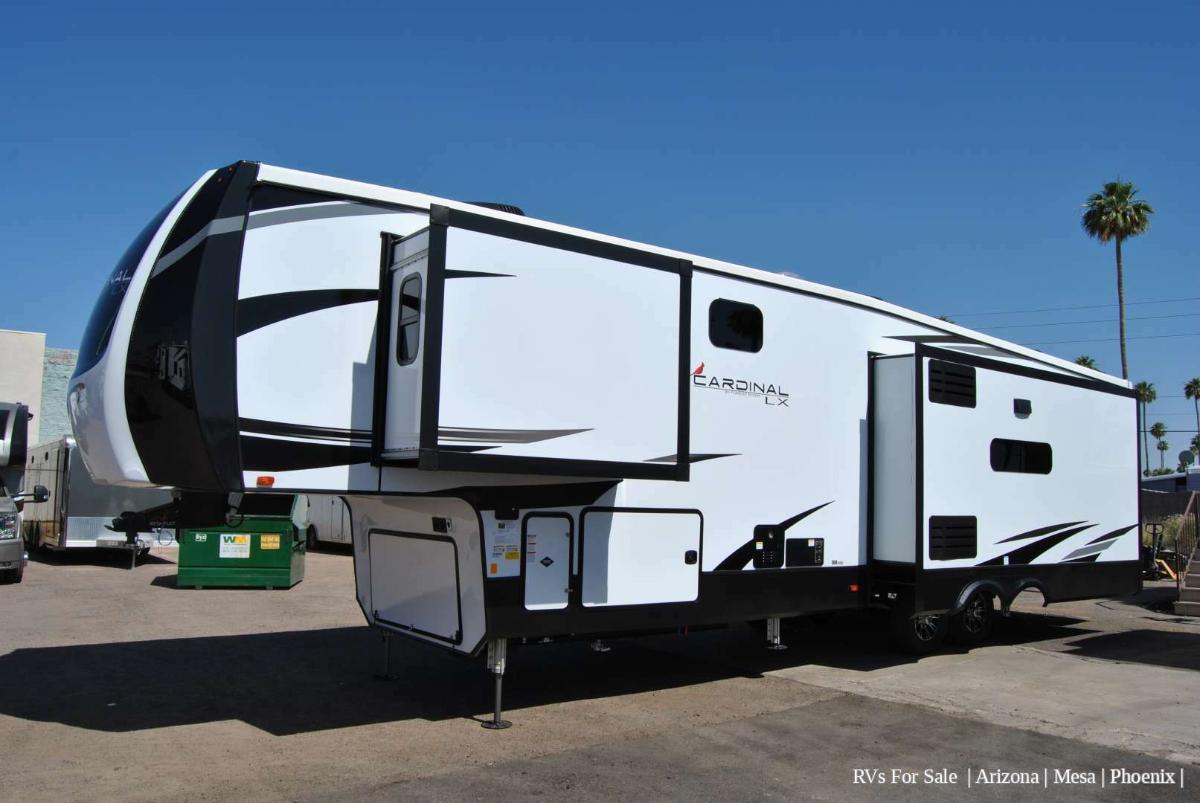 Side view of the RV with slide outs.