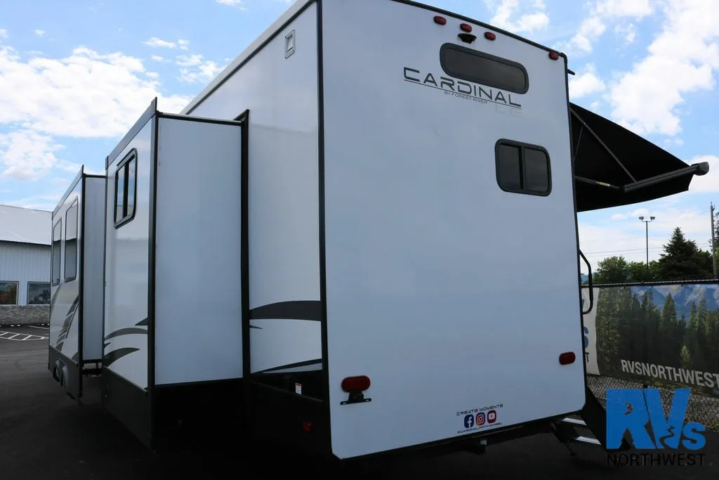 Rear view of the RV with slide outs.