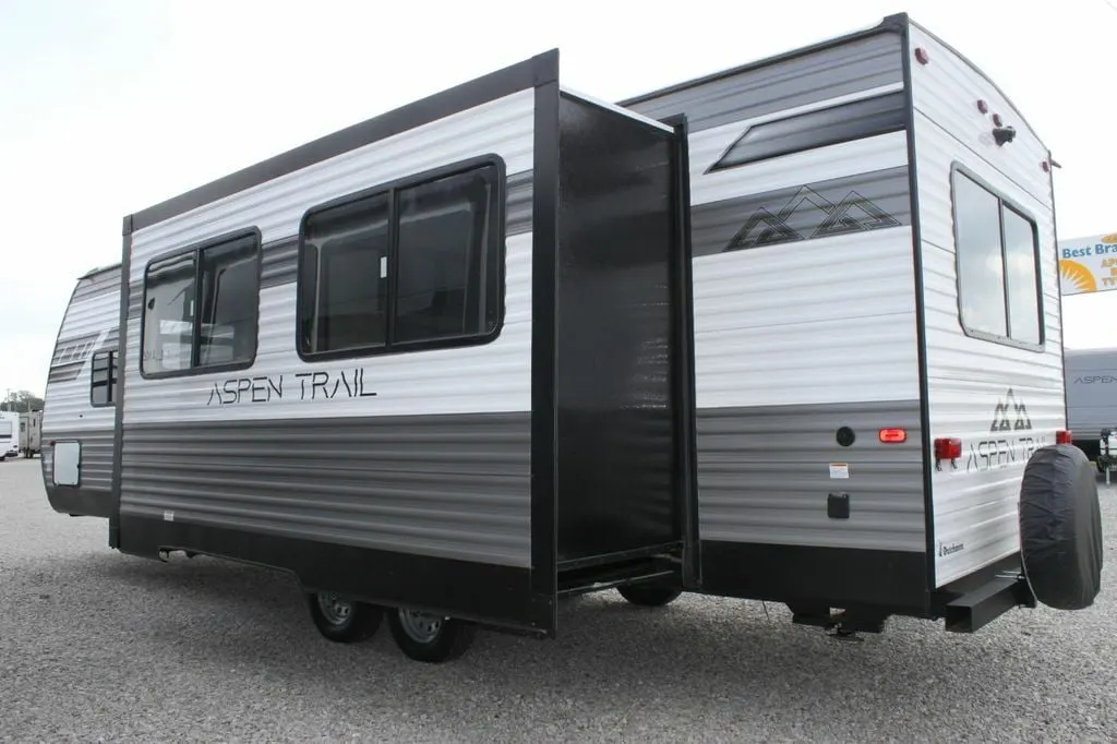 Side view of the RV with a slide out.