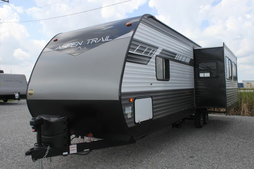 Front view of the RV with a slide out.