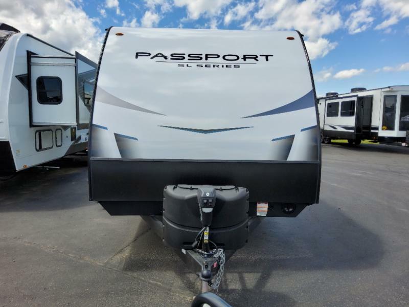 Front view of the New 2022 Keystone Rv Passport SL 219BH Travel Trailer RV.