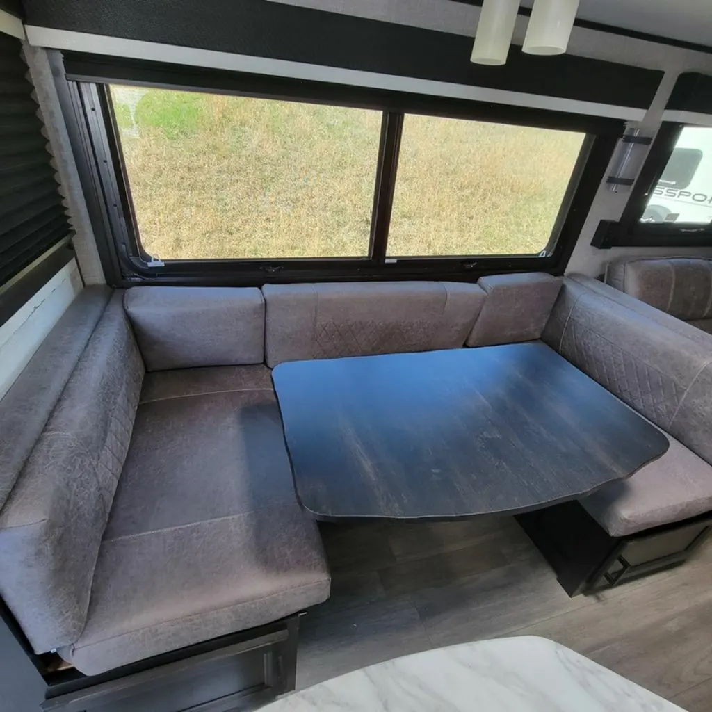 Dinette with pull-out storage drawers.