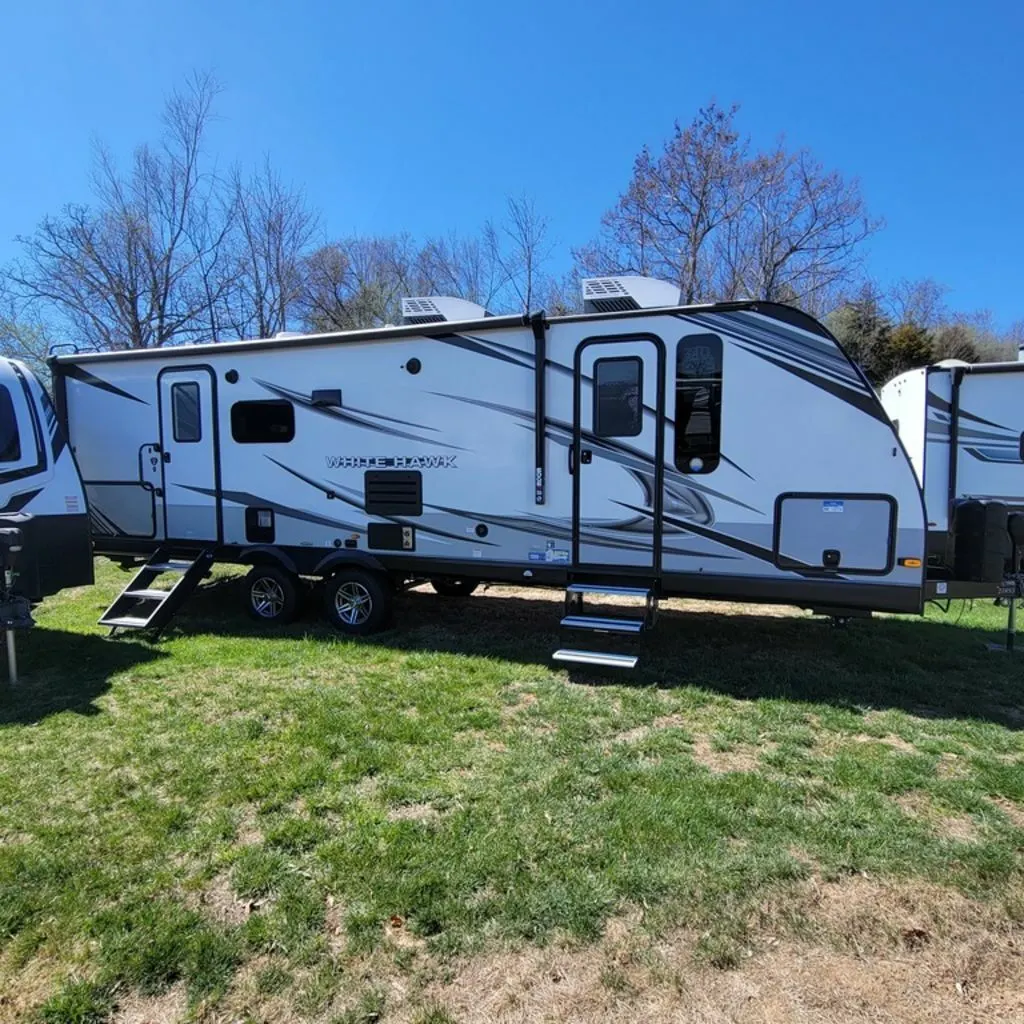 Side view of the New 2022 Jayco White Hawk 27RB Travel Trailer RV.