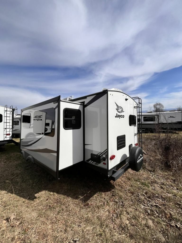 Side view of the RV with slide out.