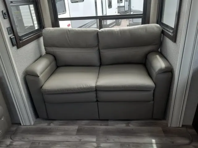 Living space with a leather seat.