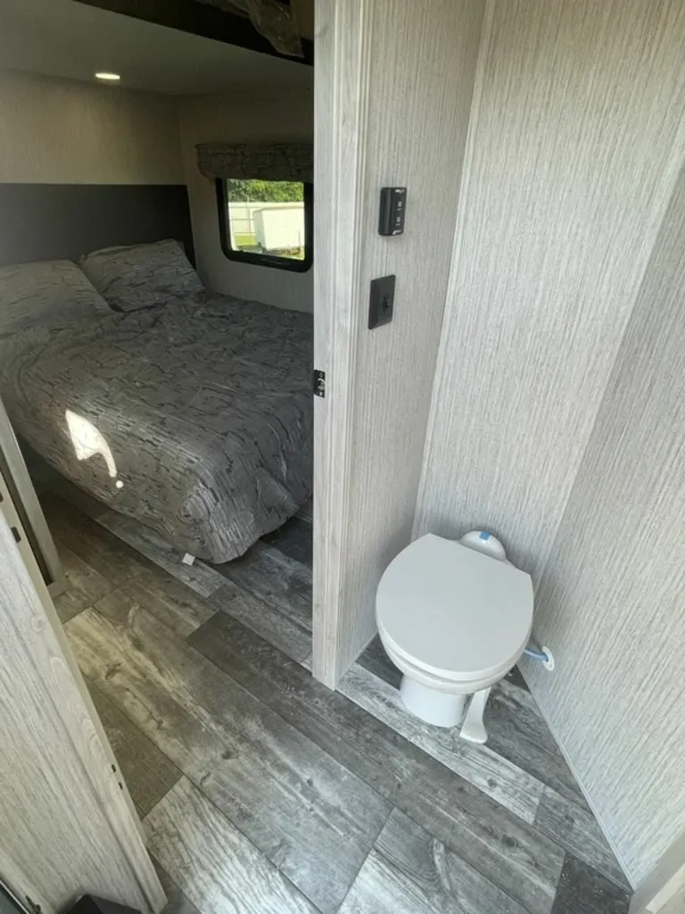 Bedroom with a toilet