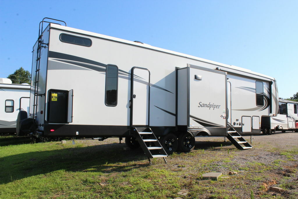 Side view of the New 2022 Forest River Sandpiper 3440BH Fifth Wheel RV.