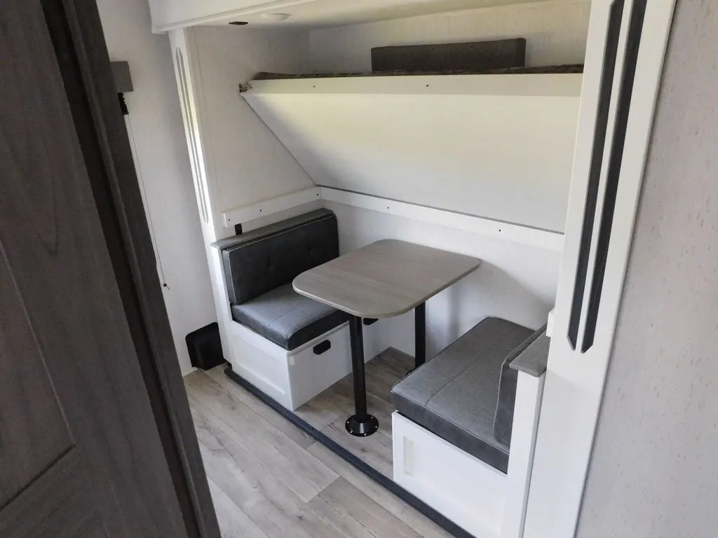 Dinette with a bed bunk.