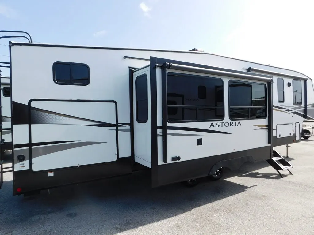 Side view of the New 2022 Dutchmen Astoria 1500 3343BHF Fifth Wheel RV.